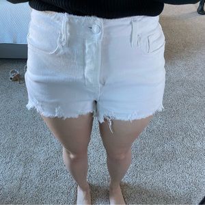 Good American Bombshell cutoff shorts